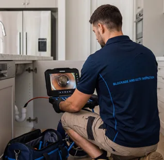 Clearing a blocked sink at a Warwick Farm property
